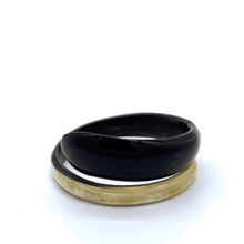 Load image into Gallery viewer, A picture of spinning Small Old Fashioned Online Minimalist polished ebony to ivory Artisan spiral bracelet bangle, made from ethically sourced natural horn
