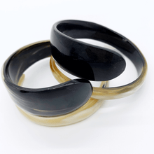 Load image into Gallery viewer, A picture of Pair of of Small Old Fashioned Online Minimalist polished ebony to ivory Artisan spiral bracelet bangle, made from ethically sourced natural horn