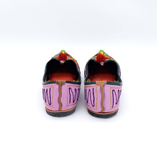 Load image into Gallery viewer, Ethically sourced bohemian Old Fashioned Online Pink Leather slip-on with blue, green and red triangle embroidery, red pompoms and cushioned footbed back view