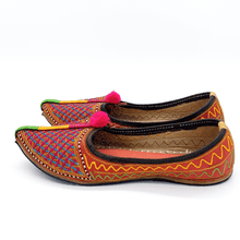 Load image into Gallery viewer, Pink and blue comfy Old Fashioned Online house flats ethical bohemian Leather slippers with lattice style embroidery, pompoms and red cushioned footbed side view 1