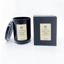 Load image into Gallery viewer, A picture of a candle and a box with labels on them